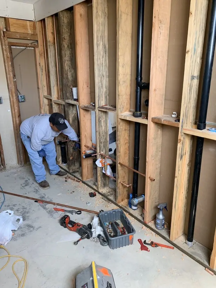 Commercial rough-in plumbing for Water Heater Replacement in Lacona
